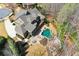 An aerial view of a large home with a pool, hot tub, outdoor seating and lush landscaping at 268 Hanson Way, Marietta, GA 30064