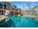 Gorgeous backyard with a beautiful in-ground pool with basketball hoop and covered patio at 268 Hanson Way, Marietta, GA 30064