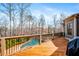 Expansive deck overlooking a pool and wooded backyard at 268 Hanson Way, Marietta, GA 30064