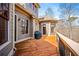 Spacious wood deck with wood railing showcasing the home's exterior at 268 Hanson Way, Marietta, GA 30064