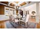 Dining room with coffered ceiling, chandelier, and bright windows at 268 Hanson Way, Marietta, GA 30064