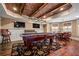 Spacious game room with a pool table, game table, brick ceiling, and hardwood floors at 268 Hanson Way, Marietta, GA 30064