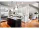 Bright and open kitchen with a large island, stainless steel appliances, and hardwood flooring at 268 Hanson Way, Marietta, GA 30064