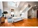 Spacious living room with fireplace, staircase, hardwood floors, and high ceilings at 268 Hanson Way, Marietta, GA 30064