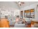 Open-concept living room with vaulted ceilings, kitchen, and cozy seating arrangement at 268 Hanson Way, Marietta, GA 30064