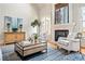 Bright and airy living room with a fireplace, hardwood floors, and modern decor at 268 Hanson Way, Marietta, GA 30064
