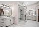 Luxurious main bathroom with double sinks, marble countertops, and a frameless glass shower at 268 Hanson Way, Marietta, GA 30064