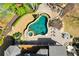 Aerial view of a backyard pool with an attached spa, lounge area, and outdoor seating at 268 Hanson Way, Marietta, GA 30064