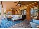 Covered patio with stylish furnishings, ceiling fans, and brick flooring at 268 Hanson Way, Marietta, GA 30064