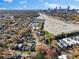 Aerial view of the neighborhood with city skyline in the distance at 1050 Boulevard Ne Dr, Atlanta, GA 30317