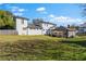 Spacious backyard featuring a covered patio area and lush greenery at 1050 Boulevard Ne Dr, Atlanta, GA 30317