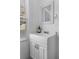 Charming half bath with a white vanity, sink, and a bright window at 1050 Boulevard Ne Dr, Atlanta, GA 30317