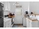 Cozy kitchen with updated appliances, white cabinetry and wood countertops at 1050 Boulevard Ne Dr, Atlanta, GA 30317