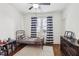 Comfortable bedroom with a ceiling fan, natural light, and a cozy atmosphere at 213 Oak Ln, Decatur, GA 30030