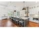 Kitchen with a large island, pendant lighting, and stainless steel appliances at 213 Oak Ln, Decatur, GA 30030