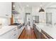 Well-appointed kitchen featuring modern appliances, white cabinets, and a functional layout at 213 Oak Ln, Decatur, GA 30030