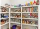 Organized pantry with ample shelving and a variety of food and beverage items at 213 Oak Ln, Decatur, GA 30030