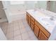 Bathroom with tub, shower and double sink vanity providing ample space at 314 Meadow Spring Dr, Temple, GA 30179