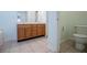 Spacious bathroom with double sink vanity and tile flooring at 314 Meadow Spring Dr, Temple, GA 30179