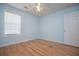 Bedroom with window, ceiling fan and hardwood floors at 314 Meadow Spring Dr, Temple, GA 30179