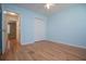 Bedroom with hardwood floors, closet and a ceiling fan at 314 Meadow Spring Dr, Temple, GA 30179