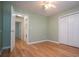 Bedroom with hardwood floors, closet and a ceiling fan at 314 Meadow Spring Dr, Temple, GA 30179