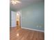 Bedroom with hardwood floors, a window and a ceiling fan at 314 Meadow Spring Dr, Temple, GA 30179