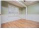 Bedroom features wood floors and a large window at 314 Meadow Spring Dr, Temple, GA 30179