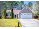 Charming single-Gathering home with well-maintained lawn, two-car garage, and inviting curb appeal at 314 Meadow Spring Dr, Temple, GA 30179