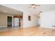 Bright living room featuring vaulted ceilings, ceiling fan, and hardwood floors at 314 Meadow Spring Dr, Temple, GA 30179