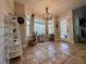 Sunlit breakfast nook with tiled flooring and views of the backyard, ideal for enjoying morning coffee at 401 Carrie Kathleen Ter, Carrollton, GA 30116