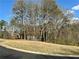 A partial view of a house on an open lot at 401 Carrie Kathleen Ter, Carrollton, GA 30116