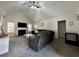 Cozy living room with fireplace, vaulted ceilings, and neutral décor creating a relaxing atmosphere at 401 Carrie Kathleen Ter, Carrollton, GA 30116