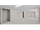 Basement featuring multiple closets and open space with neutral carpet at 4956 Braeburn Nw Trce, Acworth, GA 30102