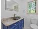 Bathroom features a vanity with granite top, vessel sink, and modern fixtures at 4956 Braeburn Nw Trce, Acworth, GA 30102