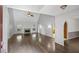 Bright living room featuring vaulted ceiling, hardwood floors, fireplace, and natural light at 4956 Braeburn Nw Trce, Acworth, GA 30102