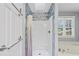 Tiled shower with curtain and a bath tub at 4956 Braeburn Nw Trce, Acworth, GA 30102