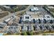 Community aerial view showing the complex with shops and restaurant in mixed-use development at 6616 Aria Village Dr, Atlanta, GA 30328