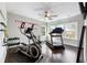 Well-equipped home gym with cardio machines, free weights, and motivational decor at 6616 Aria Village Dr, Atlanta, GA 30328