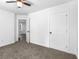 Bedroom featuring neutral carpeting and a ceiling fan at 741 Se Knox Se Dr, Atlanta, GA 30315