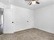 Bedroom featuring neutral carpeting, a ceiling fan, and white paint at 741 Se Knox Se Dr, Atlanta, GA 30315