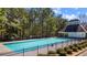 Community pool with bath house in a fenced in area at 949 Tumlin Trce, Lawrenceville, GA 30045