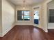 Cozy breakfast nook bathed in sunlight, offering views of the backyard pool and outdoor spaces at 129 Elite Way, Mcdonough, GA 30252