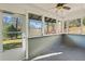 Cozy sunroom with large windows, great natural light, and neutral-colored walls at 19 Grove Park Nw Pl, Atlanta, GA 30318