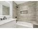 Bathroom featuring a shower, modern fixtures, and neutral tile at 2910 3Rd Sw Ave, Atlanta, GA 30315