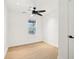 Bedroom with white walls, hardwood floors, window and modern ceiling fan at 2910 3Rd Sw Ave, Atlanta, GA 30315