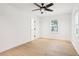 Bedroom with white walls, hardwood floors, window and a modern ceiling fan at 2910 3Rd Sw Ave, Atlanta, GA 30315