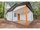 Exterior view showing rear of home, covered porch, and neutral colored siding at 2910 3Rd Sw Ave, Atlanta, GA 30315