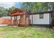 Charming renovated home featuring a covered front porch with beautiful wood beam and painted brick exterior at 2910 3Rd Sw Ave, Atlanta, GA 30315