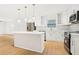 Modern kitchen with white cabinetry, stainless steel appliances, and marble countertops at 2910 3Rd Sw Ave, Atlanta, GA 30315